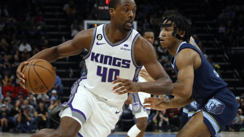 Jan 1, 2023; Memphis, Tennessee, USA; Sacramento Kings forward Harrison Barnes (40) drives to the basket as Memphis Grizzlies guard Kennedy Chandler (1) defends during the first half at FedExForum. Mandatory Credit: Petre Thomas-USA TODAY Sports