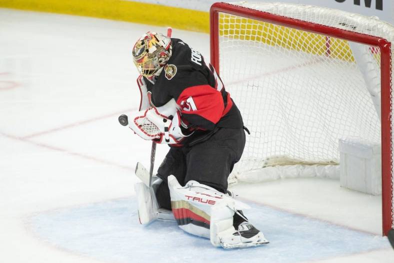 Jan 1,, 2023; Ottawa, Ontario, CAN; Ottawa Senators goalie Anton Forsberg (31) makes a save in the third period against the Buffalo Sabres at the Canadian Tire Centre. Mandatory Credit: Marc DesRosiers-USA TODAY Sports
