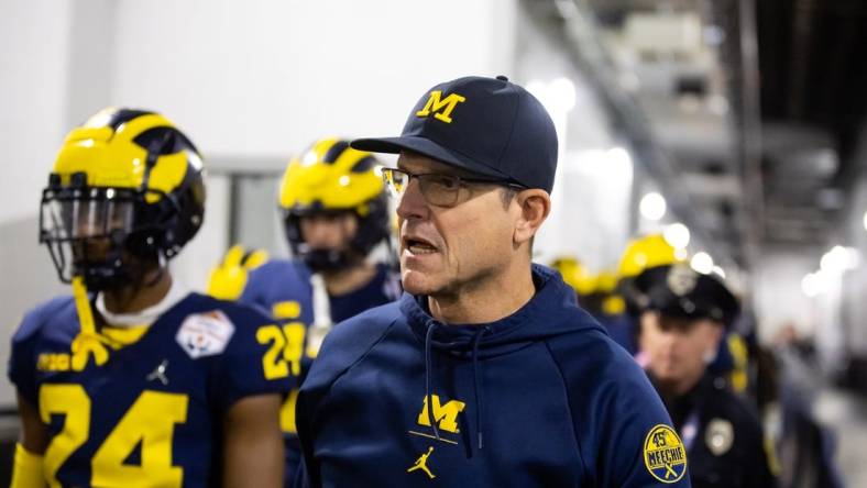 Dec 31, 2022; Glendale, Arizona, USA; Michigan Wolverines head coach Jim Harbaugh against the TCU Horned Frogs in the 2022 Fiesta Bowl at State Farm Stadium. Mandatory Credit: Mark J. Rebilas-USA TODAY Sports