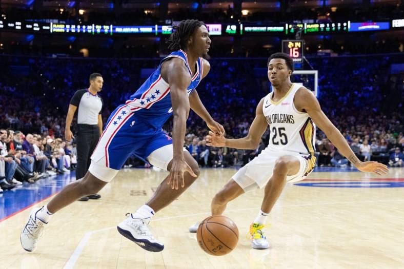 Jan 2, 2023; Philadelphia, Pennsylvania, USA; Philadelphia 76ers guard Tyrese Maxey (0) drives against New Orleans Pelicans guard Trey Murphy III (25) during the second quarter at Wells Fargo Center. Mandatory Credit: Bill Streicher-USA TODAY Sports