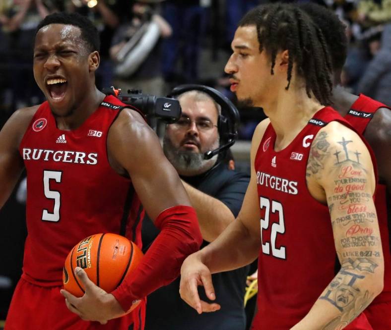 Rutgers Scarlet Knights forward Aundre Hyatt (5) and Rutgers Scarlet Knights guard Caleb McConnell (22) celebrate during the NCAA men   s basketball game against the Purdue Boilermakers, Monday, Jan. 2, 2023, at Mackey Arena in West Lafayette, Ind. Rutgers Scarlet Knights won 65-64.

Purduerutgersmbb010223 Am02694