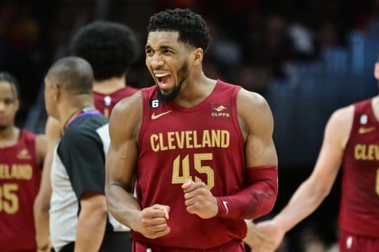 Jan 2, 2023; Cleveland, Ohio, USA; Cleveland Cavaliers guard Donovan Mitchell (45) reacts after a basket during the second half against the Chicago Bulls at Rocket Mortgage FieldHouse. Mitchell set the franchise record for points with 71. Mandatory Credit: Ken Blaze-USA TODAY Sports