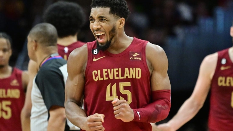 Jan 2, 2023; Cleveland, Ohio, USA; Cleveland Cavaliers guard Donovan Mitchell (45) reacts after a basket during the second half against the Chicago Bulls at Rocket Mortgage FieldHouse. Mitchell set the franchise record for points with 71. Mandatory Credit: Ken Blaze-USA TODAY Sports