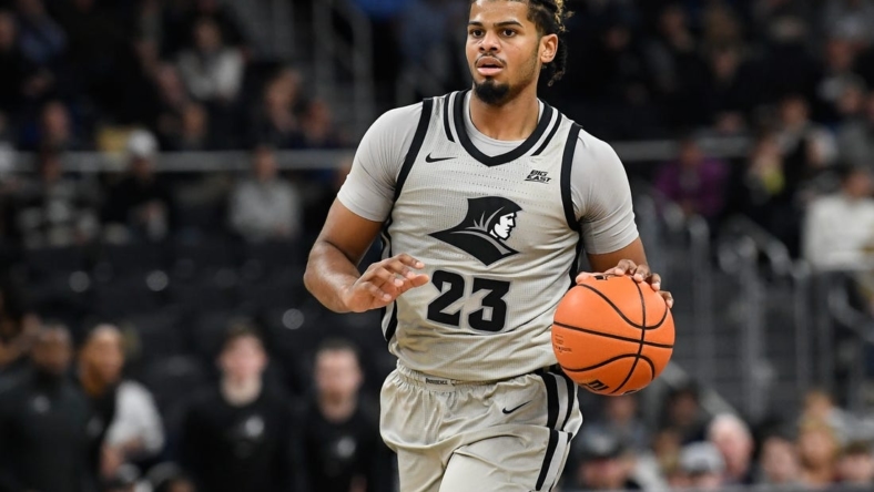 Dec 20, 2022; Providence, Rhode Island, USA; Providence Friars forward Bryce Hopkins (23) dribbles the ball during the first half against the Marquette Golden Eagles at Amica Mutual Pavilion. Mandatory Credit: Eric Canha-USA TODAY Sports
