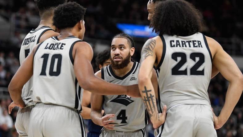 Dec 20, 2022; Providence, Rhode Island, USA; Providence Friars guard Jared Bynum (4) huddles the team during the first half against the Marquette Golden Eagles at Amica Mutual Pavilion. Mandatory Credit: Eric Canha-USA TODAY Sports