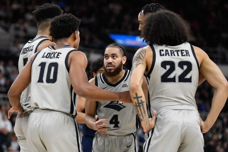Dec 20, 2022; Providence, Rhode Island, USA; Providence Friars guard Jared Bynum (4) huddles the team during the first half against the Marquette Golden Eagles at Amica Mutual Pavilion. Mandatory Credit: Eric Canha-USA TODAY Sports
