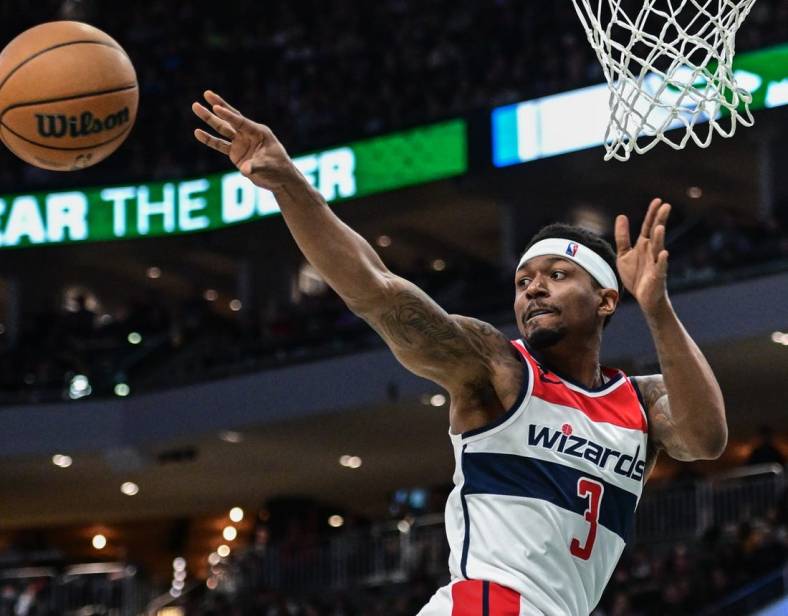 Jan 3, 2023; Milwaukee, Wisconsin, USA; Washington Wizards guard Bradley Beal (3) passes in the second quarter during game against the Milwaukee Bucks at Fiserv Forum. Mandatory Credit: Benny Sieu-USA TODAY Sports