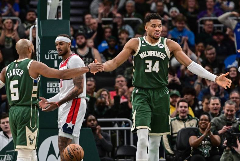Jan 3, 2023; Milwaukee, Wisconsin, USA; Milwaukee Bucks forward Giannis Antetokounmpo (34) reacts after scoring a basket in the second quarter during game against the Washington Wizards at Fiserv Forum. Mandatory Credit: Benny Sieu-USA TODAY Sports