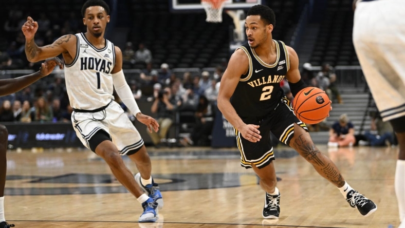 Jan 4, 2023; Washington, District of Columbia, USA; Villanova Wildcats guard Mark Armstrong (2) dribbles as Georgetown Hoyas guard Primo Spears (1) defends during the first half at Capital One Arena. Mandatory Credit: Brad Mills-USA TODAY Sports