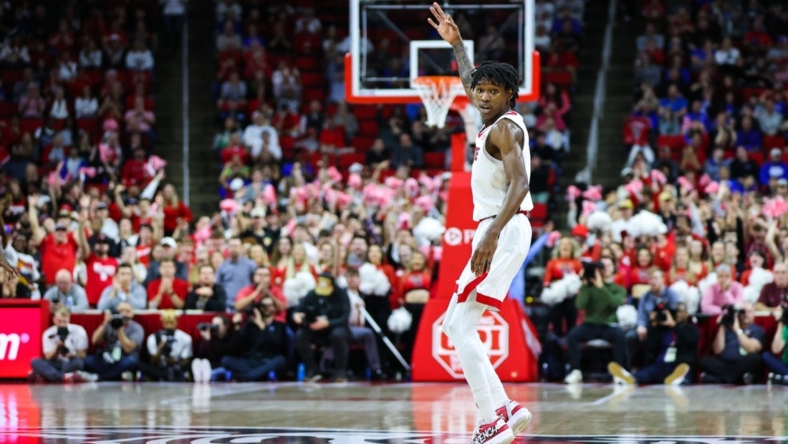 Jan 4, 2023; Raleigh, North Carolina, USA;  North Carolina State Wolfpack guard Terquavion Smith (0) celebrates a thee pointer during the first half against Duke Blue Devils at PNC Arena. Mandatory Credit: Jaylynn Nash-USA TODAY Sports