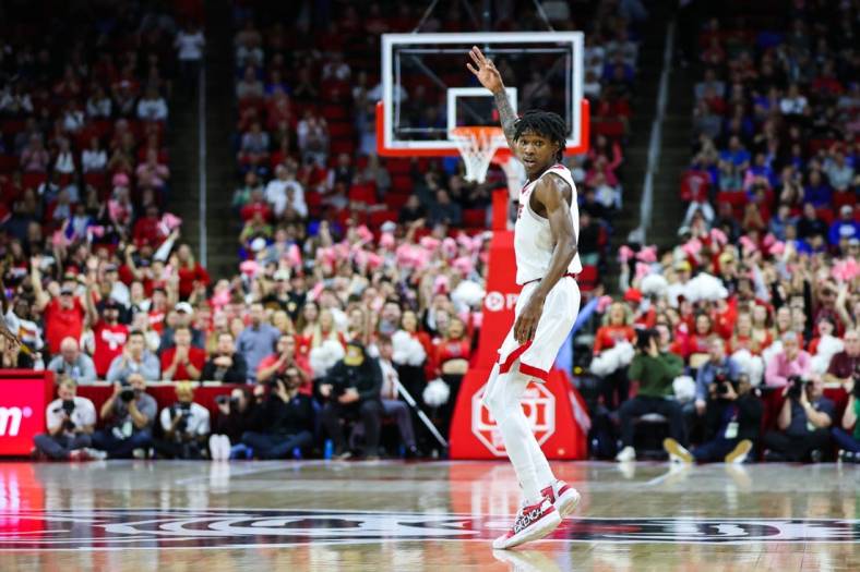 Jan 4, 2023; Raleigh, North Carolina, USA;  
North Carolina State Wolfpack guard Terquavion Smith (0) celebrates a thee pointer during the first half against Duke Blue Devils at PNC Arena. Mandatory Credit: Jaylynn Nash-USA TODAY Sports