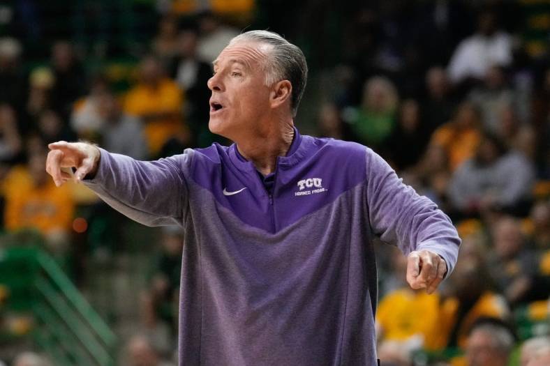 Jan 4, 2023; Waco, Texas, USA; TCU Horned Frogs head coach Jamie Dixon calls a play against the Baylor Bears during the first half at Ferrell Center. Mandatory Credit: Chris Jones-USA TODAY Sports