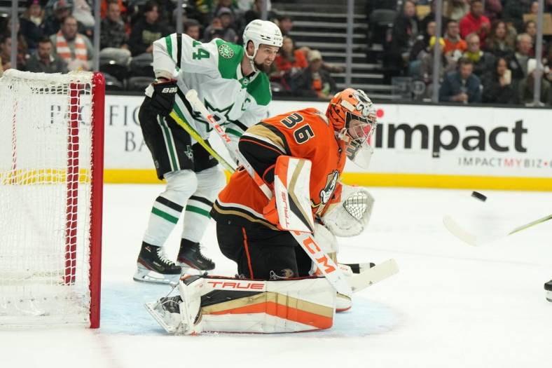 Jan 4, 2023; Anaheim, California, USA; Anaheim Ducks goaltender John Gibson (36) defends the goal against the Dallas Stars in the second period at Honda Center. Mandatory Credit: Kirby Lee-USA TODAY Sports