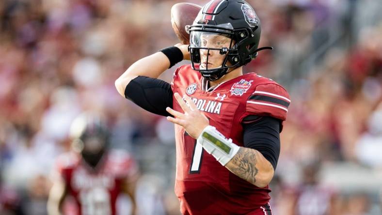 Dec 30, 2022; Jacksonville, FL, USA; South Carolina Gamecocks quarterback Spencer Rattler (7) throws the ball during the first half against the Notre Dame Fighting Irish in the 2022 Gator Bowl at TIAA Bank Field. Mandatory Credit: Matt Pendleton-USA TODAY Sports