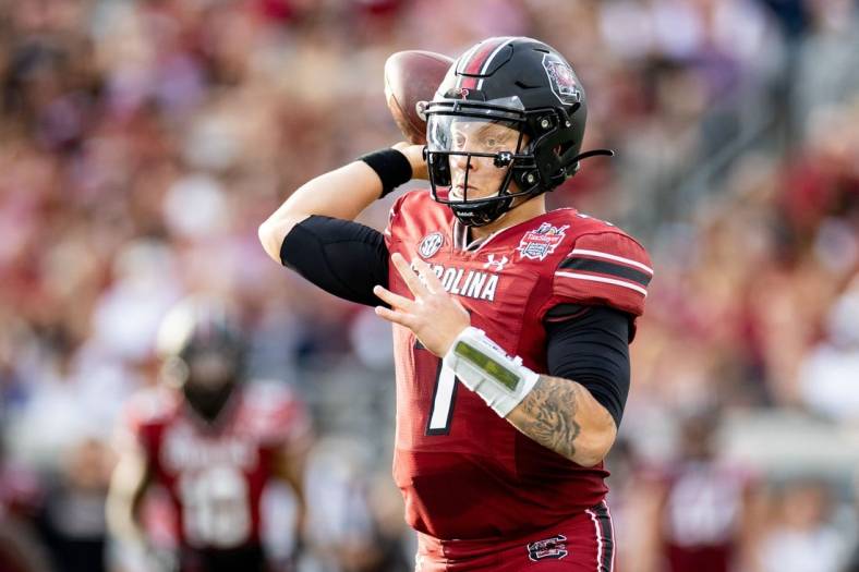 Dec 30, 2022; Jacksonville, FL, USA; South Carolina Gamecocks quarterback Spencer Rattler (7) throws the ball during the first half against the Notre Dame Fighting Irish in the 2022 Gator Bowl at TIAA Bank Field. Mandatory Credit: Matt Pendleton-USA TODAY Sports