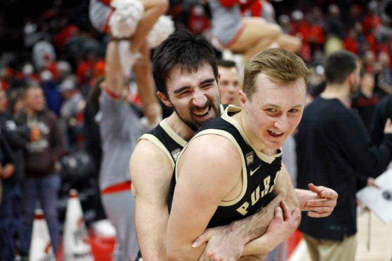 Jan 5, 2023; Columbus, Ohio, USA;  Purdue Boilermakers guard Ethan Morton (left) and guard Fletcher Loyer (right) celebrate the win against the Ohio State Buckeyes at Value City Arena. Mandatory Credit: Joseph Maiorana-USA TODAY Sports
