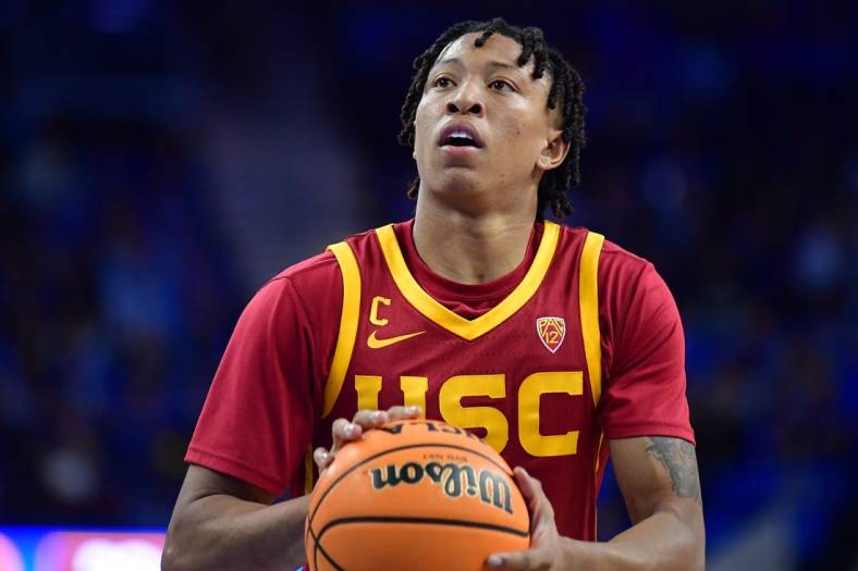Jan 5, 2023; Los Angeles, California, USA; Southern California Trojans guard Boogie Ellis (5) shoots a free throw against the UCLA Bruins during the second half at Pauley Pavilion. Mandatory Credit: Gary A. Vasquez-USA TODAY Sports