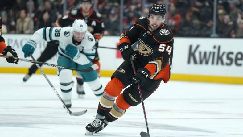 Jan 6, 2023; Anaheim, California, USA; Anaheim Ducks center Justin Kirkland (54) skates with the puck against the San Jose Sharks in the second period at Honda Center. Mandatory Credit: Kirby Lee-USA TODAY Sports