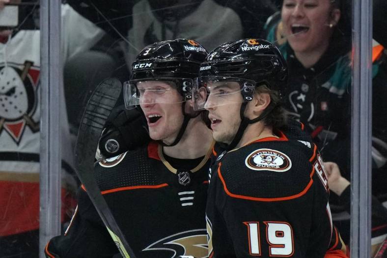 Jan 6, 2023; Anaheim, California, USA; Anaheim Ducks defenseman John Klingberg (3) celebrates with right wing Troy Terry (19) after scoring the winning goal in overtime against the San Jose Sharks Honda Center. The Ducks defeated the Sharks 5-4 in overtime. Mandatory Credit: Kirby Lee-USA TODAY Sports