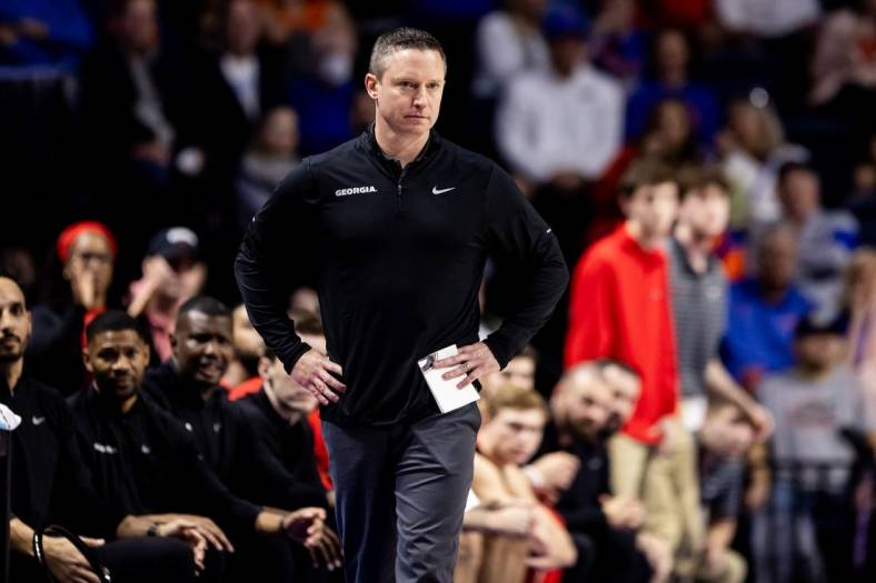 Jan 7, 2023; Gainesville, Florida, USA; Georgia Bulldogs head coach Mike White looks on during the first half against the Florida Gators at Exactech Arena at the Stephen C. O'Connell Center. Mandatory Credit: Matt Pendleton-USA TODAY Sports
