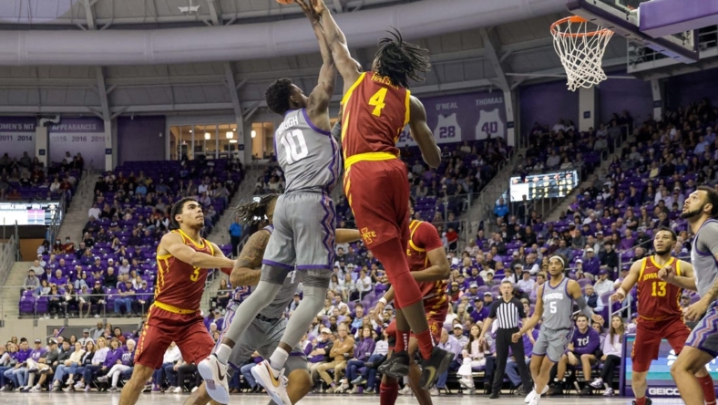 Jan 7, 2023; Fort Worth, Texas, USA; Iowa State Cyclones guard Demarion Watson (4) blocks a shot by TCU Horned Frogs guard Damion Baugh (10) during the first half at Ed and Rae Schollmaier Arena. Mandatory Credit: Andrew Dieb-USA TODAY Sports