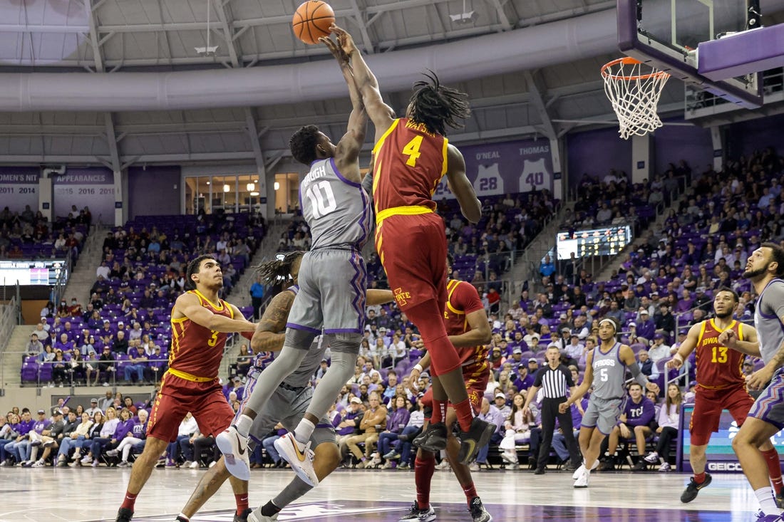 Jan 7, 2023; Fort Worth, Texas, USA; Iowa State Cyclones guard Demarion Watson (4) blocks a shot by TCU Horned Frogs guard Damion Baugh (10) during the first half at Ed and Rae Schollmaier Arena. Mandatory Credit: Andrew Dieb-USA TODAY Sports