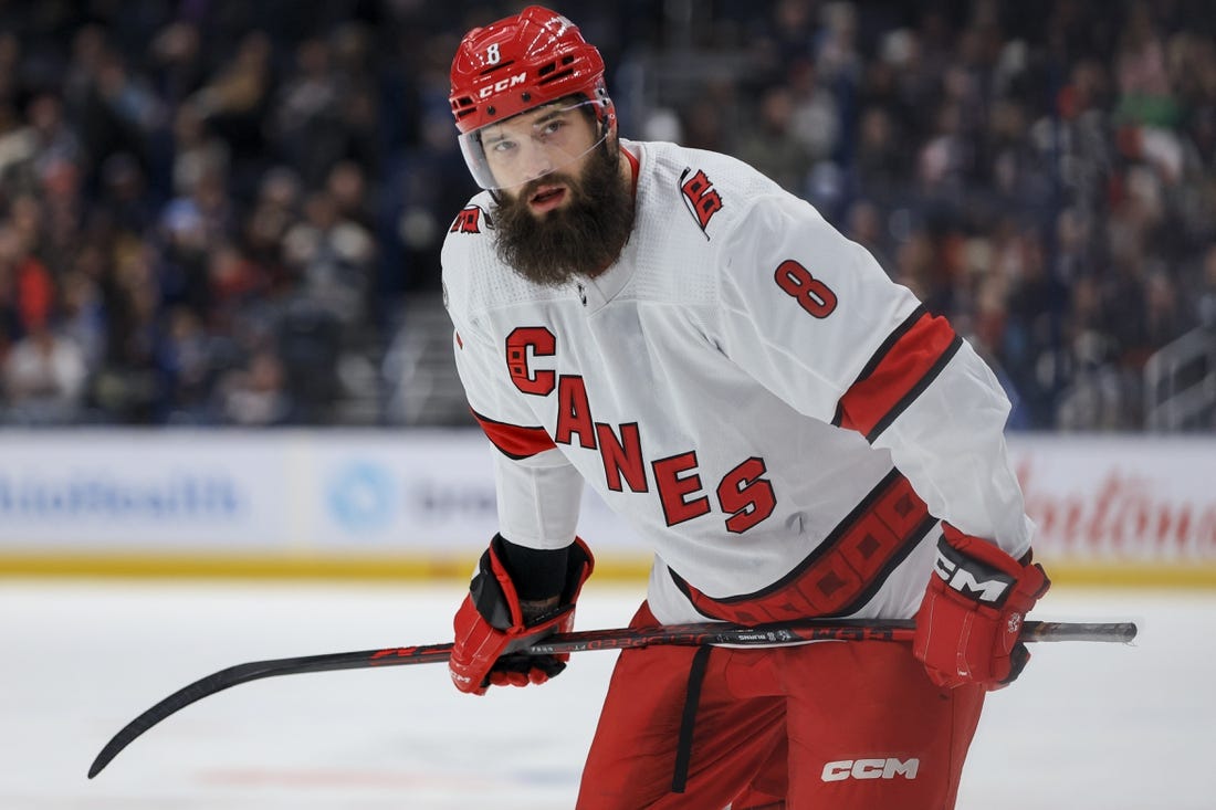 Jan 7, 2023; Columbus, Ohio, USA;  Carolina Hurricanes defenseman Brent Burns (8) awaits the face-off against the Columbus Blue Jackets in the first period at Nationwide Arena. Mandatory Credit: Aaron Doster-USA TODAY Sports