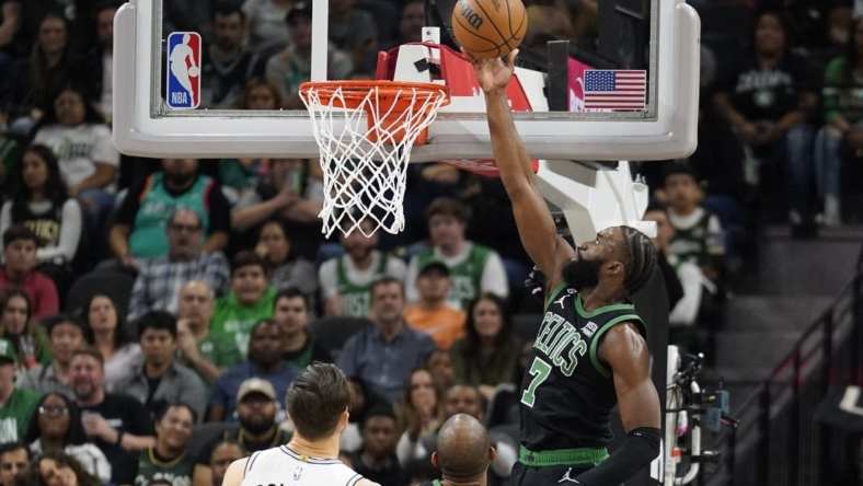 Jan 7, 2023; San Antonio, Texas, USA; Boston Celtics forward Jaylen Brown (7) lays in a basket during the first half against the San Antonio Spurs at AT&T Center. Mandatory Credit: Scott Wachter-USA TODAY Sports