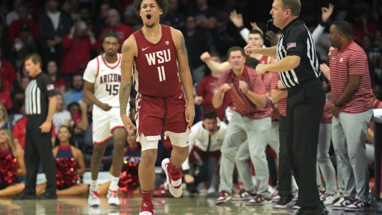 Jan 7, 2023; Tucson, Arizona, USA; The Washington State Cougars bench reacts after a three point basket by Washington State Cougars forward DJ Rodman (11) during the second half against the Arizona Wildcats at McKale Center. Mandatory Credit: Joe Camporeale-USA TODAY Sports