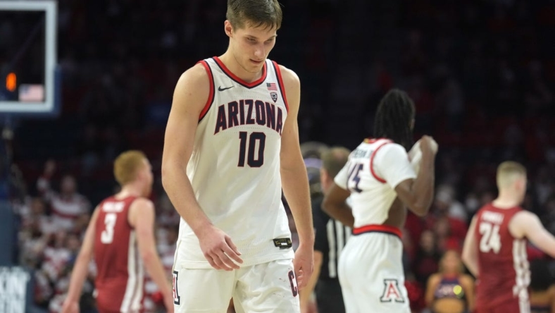 Jan 7, 2023; Tucson, Arizona, USA; Arizona Wildcats forward Azuolas Tubelis (10) leaves the court after being defeated by the Washington State Cougars at McKale Center. Mandatory Credit: Joe Camporeale-USA TODAY Sports