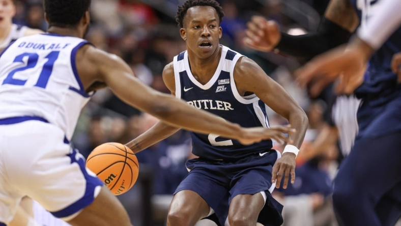Jan 7, 2023; Newark, New Jersey, USA; Butler Bulldogs guard Eric Hunter Jr. (2) dribbles against Seton Hall Pirates guard Femi Odukale (21) during the first half at Prudential Center. Mandatory Credit: Vincent Carchietta-USA TODAY Sports