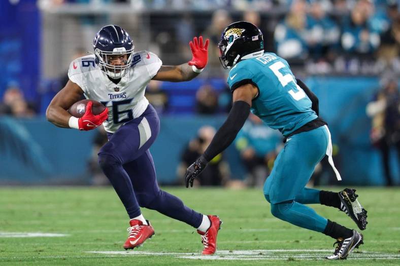 Jan 7, 2023; Jacksonville, Florida, USA;  Tennessee Titans wide receiver Treylon Burks (16) runs with the ball against the Jacksonville Jaguars in the second quarter at TIAA Bank Field. Mandatory Credit: Nathan Ray Seebeck-USA TODAY Sports