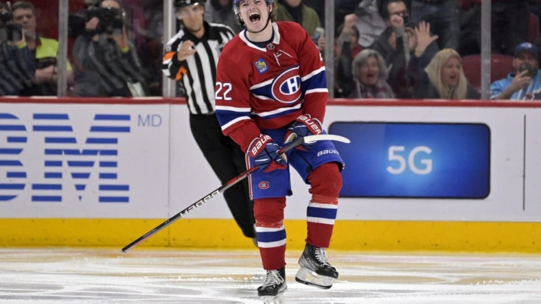 Jan 7, 2023; Montreal, Quebec, CAN; Montreal Canadiens forward Cole Caufield (22) celebrates after scoring a goal against the St. Louis Blues during the third period at the Bell Centre. Mandatory Credit: Eric Bolte-USA TODAY Sports