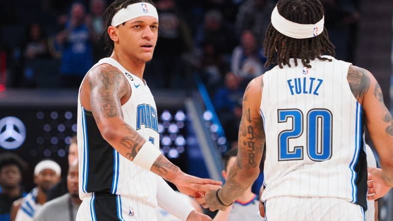 Jan 7, 2023; San Francisco, California, USA; Orlando Magic power forward Paolo Banchero (5) celebrates with point guard Markelle Fultz (20) after defeating the Golden State Warriors at Chase Center. Mandatory Credit: Kelley L Cox-USA TODAY Sports