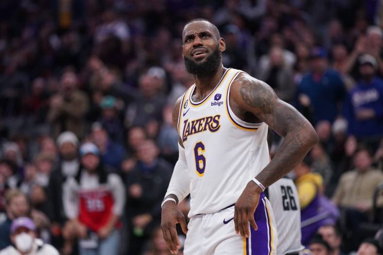 Jan 7, 2023; Sacramento, California, USA; Los Angeles Lakers forward LeBron James (6) reacts after being called for an offensive foul against the Sacramento Kings in the fourth quarter at the Golden 1 Center. Mandatory Credit: Cary Edmondson-USA TODAY Sports