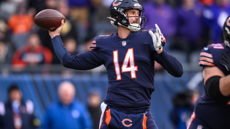 Jan 8, 2023; Chicago, Illinois, USA; Chicago Bears quarterback Nathan Peterman (14) passes the ball during the first quarter against the Minnesota Vikings at Soldier Field. Mandatory Credit: Daniel Bartel-USA TODAY Sports