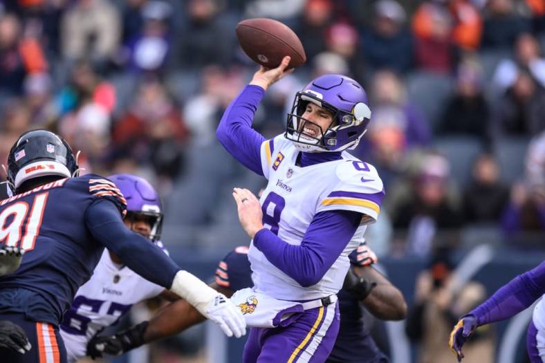 Jan 8, 2023; Chicago, Illinois, USA; Minnesota Vikings quarterback Kirk Cousins (8) passes the ball during the first quarter against the Chicago Bears at Soldier Field. Mandatory Credit: Daniel Bartel-USA TODAY Sports