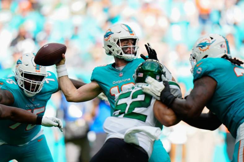 Jan 8, 2023; Miami Gardens, Florida, USA; Miami Dolphins quarterback Skylar Thompson (19) throws a pass against the New York Jets during the second quarter at Hard Rock Stadium. Mandatory Credit: Rich Storry-USA TODAY Sports