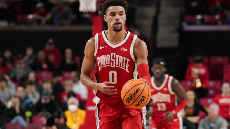 Jan 8, 2023; College Park, Maryland, USA; Ohio State Buckeyes guard Tanner Holden (0) dribbles the ball in the first half in a game against the Maryland Terrapins at Xfinity Center. Mandatory Credit: Brent Skeen-USA TODAY Sports