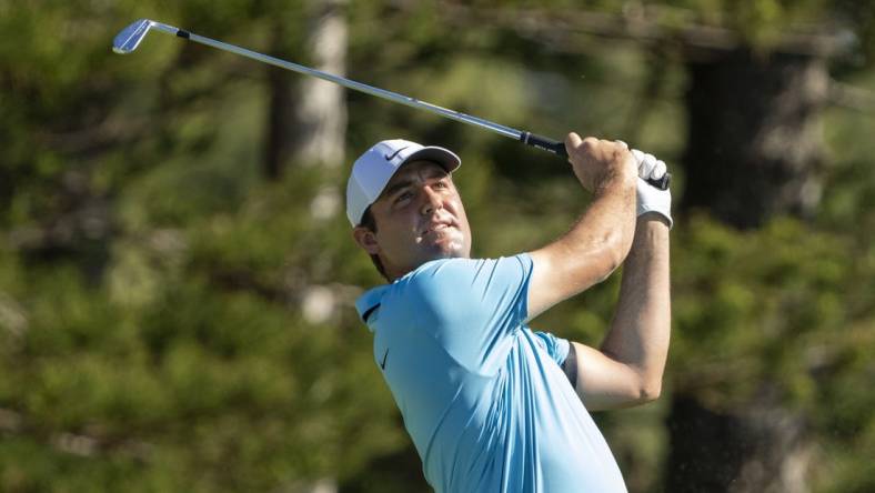 January 8, 2023; Maui, Hawaii, USA; Scottie Scheffler hits his tee shot on the second hole during the final round of the Sentry Tournament of Champions golf tournament at Kapalua Resort - The Plantation Course. Mandatory Credit: Kyle Terada-USA TODAY Sports