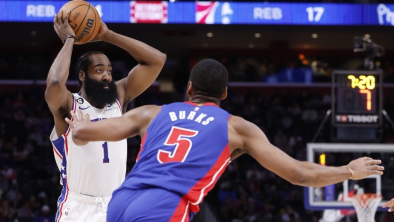 Jan 8, 2023; Detroit, Michigan, USA;  Philadelphia 76ers guard James Harden (1) is defended by Detroit Pistons guard Alec Burks (5) in the first half at Little Caesars Arena. Mandatory Credit: Rick Osentoski-USA TODAY Sports