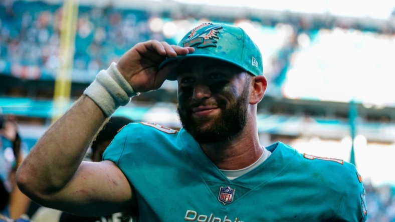 Jan 8, 2023; Miami Gardens, Florida, USA; Miami Dolphins quarterback Skylar Thompson (19) walks of the field after beating the New York Jets at Hard Rock Stadium. Mandatory Credit: Rich Storry-USA TODAY Sports
