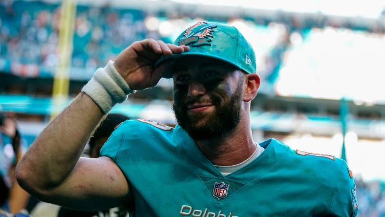 Jan 8, 2023; Miami Gardens, Florida, USA; Miami Dolphins quarterback Skylar Thompson (19) walks of the field after beating the New York Jets at Hard Rock Stadium. Mandatory Credit: Rich Storry-USA TODAY Sports