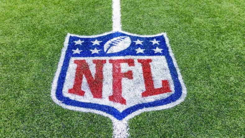 Jan 8, 2023; New Orleans, Louisiana, USA;  Detailed view of the NFL shield logo on the field after the game between the New Orleans Saints and the Carolina Panthers at Caesars Superdome. Mandatory Credit: Stephen Lew-USA TODAY Sports