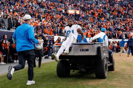 Jan 8, 2023; Denver, Colorado, USA; Los Angeles Chargers wide receiver Mike Williams (81) is carted off the field in the second quarter against the Denver Broncos at Empower Field at Mile High. Mandatory Credit: Isaiah J. Downing-USA TODAY Sports