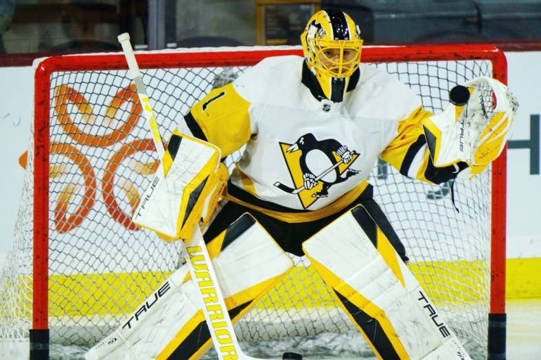 Jan 8, 2023; Tempe, Arizona, USA; Pittsburgh Penguins goalie Casey DeSmith (1) warms up prior before a game against the Arizona Coyotes at Mullett Arena. Mandatory Credit: Allan Henry-USA TODAY Sports