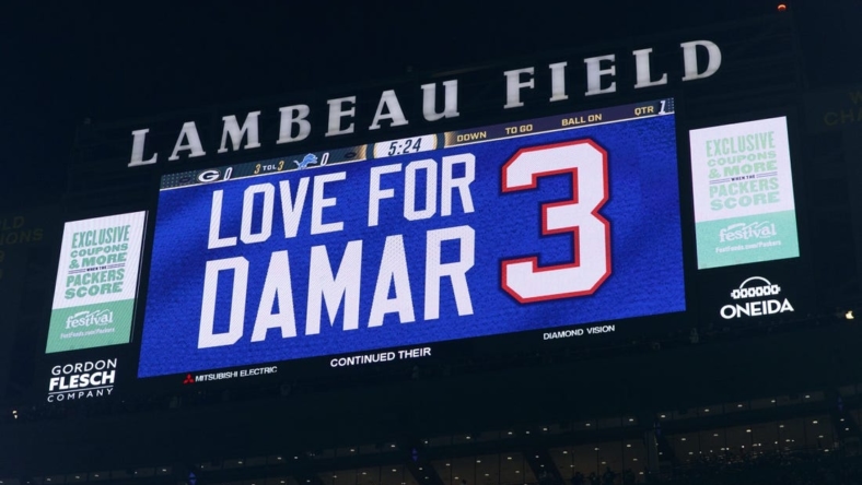 Jan 8, 2023; Green Bay, Wisconsin, USA;  A tribute to Damar Hamlin is shown on the scoreboard prior to the game between the Detroit Lions and Green Bay Packers at Lambeau Field. Mandatory Credit: Jeff Hanisch-USA TODAY Sports
