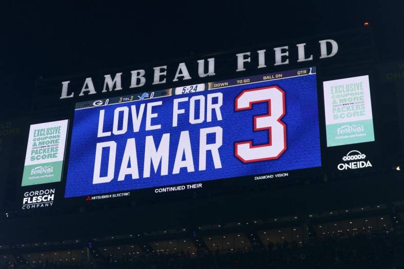 Jan 8, 2023; Green Bay, Wisconsin, USA;  A tribute to Damar Hamlin is shown on the scoreboard prior to the game between the Detroit Lions and Green Bay Packers at Lambeau Field. Mandatory Credit: Jeff Hanisch-USA TODAY Sports