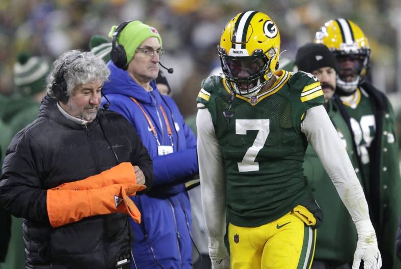 Jan 8, 2023; Green Bay, Wisconsin, USA; Green Bay Packers linebacker Quay Walker (7) leaves the field after he was ejected from the game against the Detroit Lions during their football gam at Lambeau Field. Mandatory Credit: Dan Powers/Appleton Post-Crescent via USA TODAY NETWORK