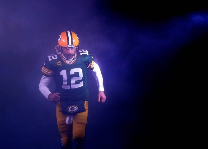 Green Bay Packers quarterback Aaron Rodgers (12) runs out on to the field as he is announced against the Detroit Lions during their football game Sunday, January 8, 2023, at Lambeau Field in Green Bay, Wis. Dan Powers/USA TODAY NETWORK-Wisconsin

Apc Packvsdetroit 0108230308djp